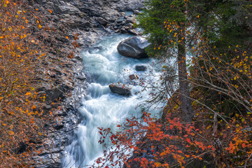 Wild river stream among cliffs and rocks, Enguri, autumn time in Mestia, Svaneti, Georgia