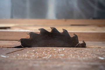 Man doing woodwork in carpentry. Carpenter work on wood plank in workshop