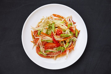 Top view of Som tam or papaya salad.