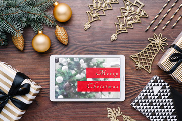 Beautiful celebratory Christmas background. New Year's holidays. Christmas holidays. Beautiful Christmas decorations on the wooden background. Loft style. Mockup