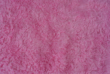 Pink terry towel, bamboo cloth, bamboo towel on a white background