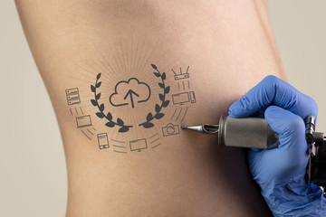 Hand tattooing colorful communication, leadership and creativity concept on naked clear skin
