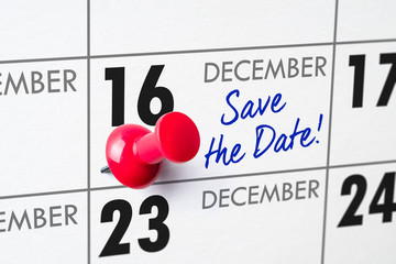 Wall calendar with a red pin - December 16