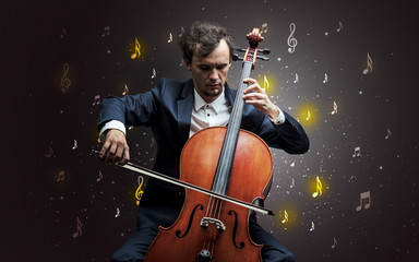 Fototapeta premium Young cellist with falling musical notes wallpaper and classical concept
