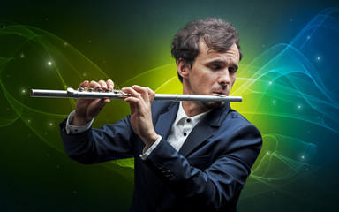 Serious classical flutist with fabled sparkling wallpaper
