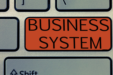 Writing note showing Business System. Business photo showcasing A method of analyzing the information of organizations. © A