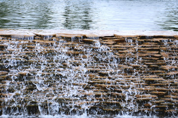water flows over the rocks