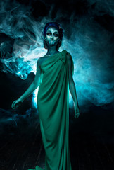 Young siren standing in the twilight fog