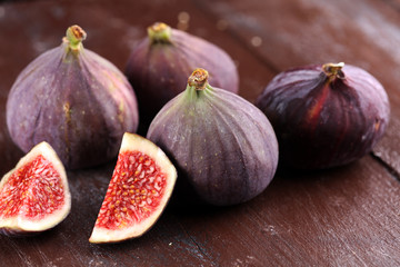 Fresh figs. Food Photo. whole and sliced figs on rustic background.