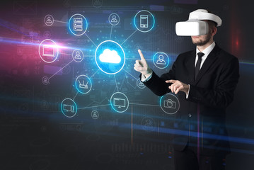 Businessman in vr glasses organize lifesize projected social media concept
