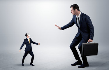 Conflict between small masked businessman and big elegant businessman
