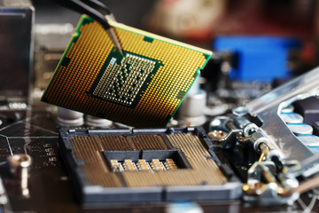 Electronic engineer of computer technology. Maintenance computer cpu hardware upgrade of motherboard component. Pc repair, technician and industry support.