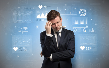 Young sick businessman with fever and medical research concept
