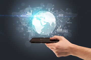 Hand using phone with multinational worldwide estate report concept
