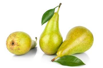 Three pears with green leaves on white background isolated close up