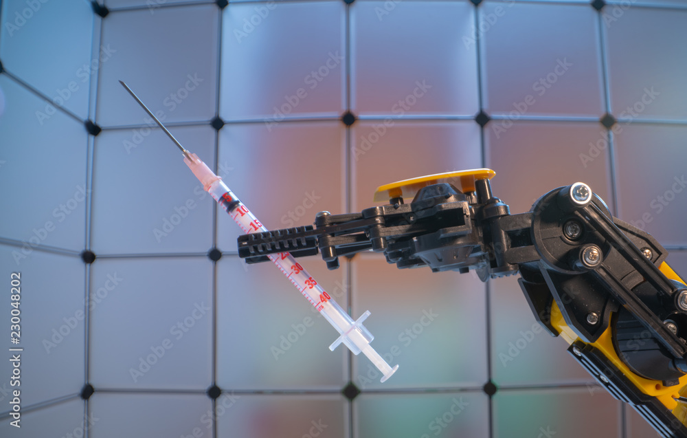 Canvas Prints Medical syringe in the   robot arm, Model of industrial robot manipulator, robot hand  with medical syringe