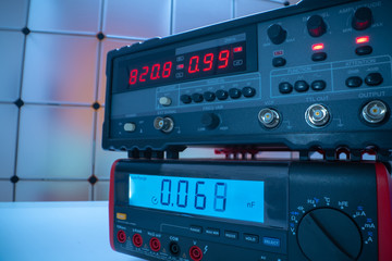 Electronic measuring instrument. Function generator and  Multimeter Instrument for measuring voltage