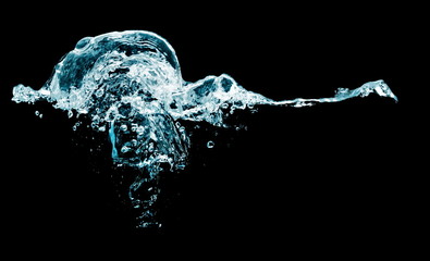 water splash with drops isolated on black background