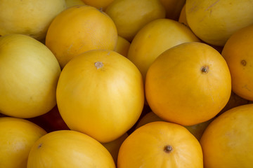 a lot of yellow melons