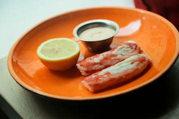 Crab meat with lemon and sauce