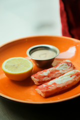 Crab meat with lemon and sauce