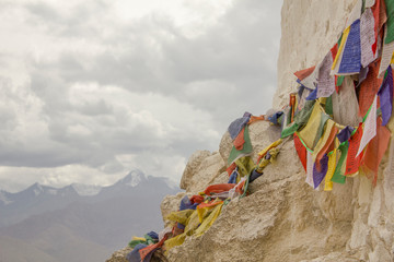 Leh, Ladakh, Jammu and Kashmir/ India - 13.08.2018: Tibetan prayer colored flags with mantras on a...