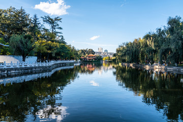 Fototapeta na wymiar Blue lake in the public park