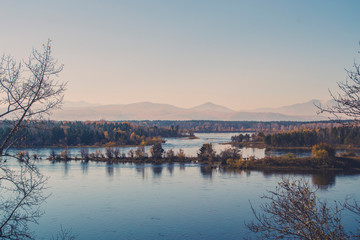 Autumn mountain forest landscape with roads and rivers
