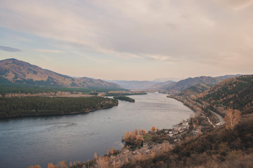 Autumn mountain forest landscape with roads and rivers