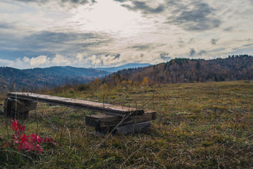 Autumn mountain forest landscape with roads and rivers