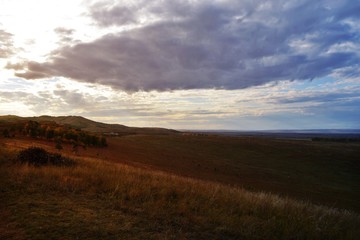 Autumn mountain forest landscape with roads and rivers