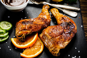 Grilled chicken legs with boiled potatoes and vegetables