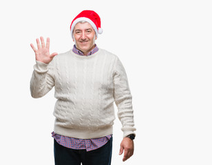 Handsome senior man wearing christmas hat over isolated background showing and pointing up with fingers number five while smiling confident and happy.