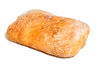 One traditional italian wheat bread ciabatta cooked with olive oil. Nobody. Isolated on white background