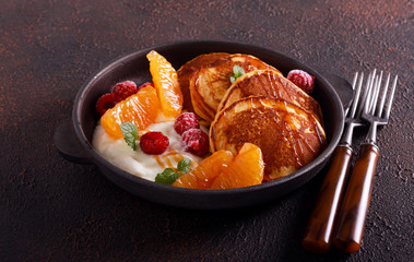Pancakes with caramel, yogurt
