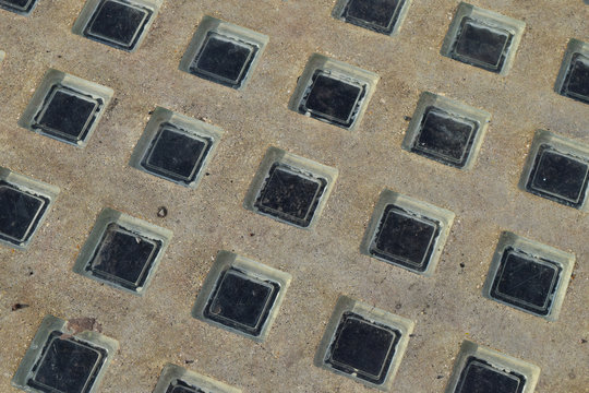 Small Glass Windows set in Concrete