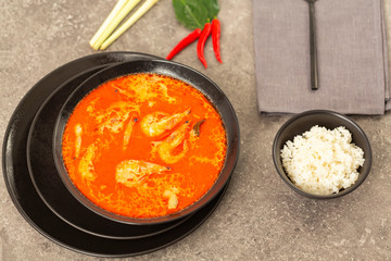 Thai spicy-sour soup Tom Yam with shrimp