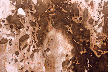 Abstract background for text or image. Ebru technique. Modern art. Marbled paper. Marbleized effect. Marble paper texture. Brown.