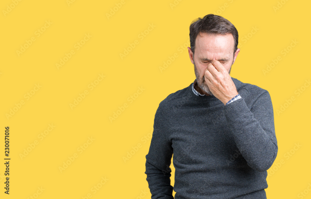 Canvas Prints Handsome middle age senior man wearing a sweater over isolated background tired rubbing nose and eyes feeling fatigue and headache. Stress and frustration concept.