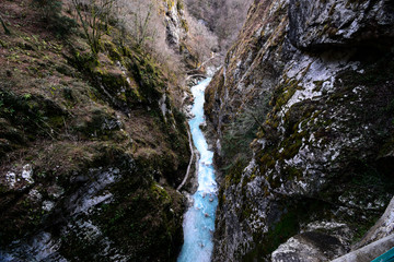 Tolmin Gorge (Tolminska Korita, Korita Tolminke) is a narrow canyon in Julian Alps, close to Tolmin, Soča Valley, Slovenia. Within the gorge is a clear stream with a number of rapid and waterfalls. 