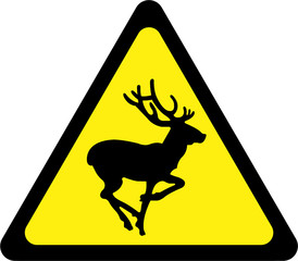 Warning sign with deers on road