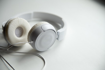 white headphones on a white background
