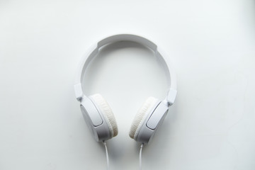 white headphones on a white background