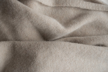 folds of beige wool