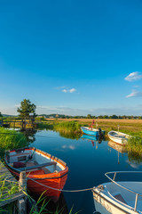 Obraz premium Fishing boats at the canal Baaber Bek in Baabe-Moritzdorf