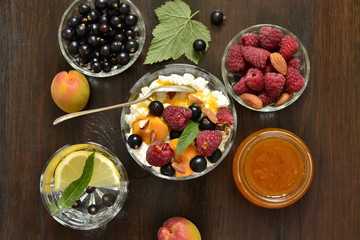 Cottage cheese with fresh berries and jam for breakfast,  top view 