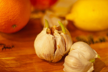 large heads of garlic lie on the table close-up