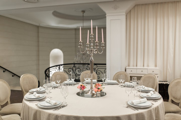 banquet table served and decorated with fresh flowers