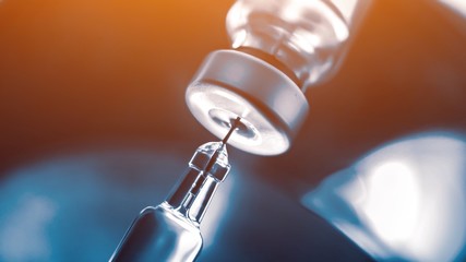 Vaccine vial dose flu shot drug needle syringe,medical concept vaccination hypodermic injection treatment disease care hospital prevention immunization illness disease  baby child.blue background 