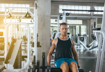 Fitness sport man doing exercises training,Cross fit body and muscular in the gym